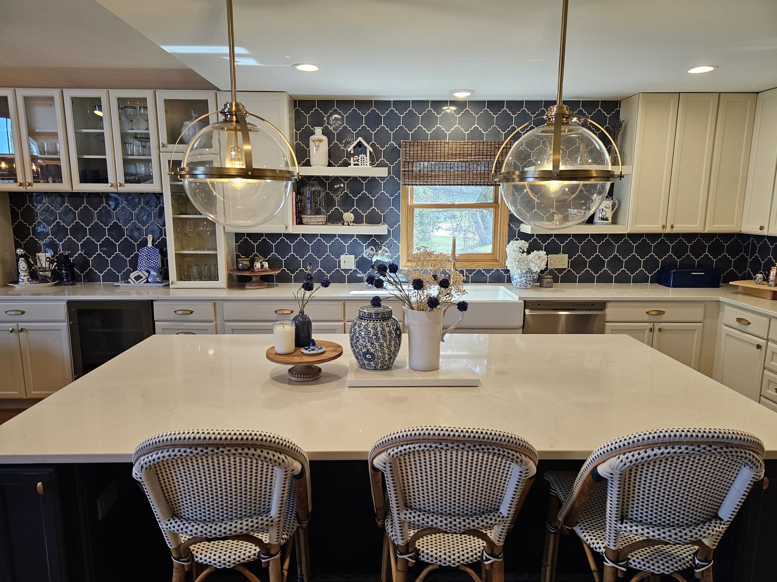 Kitchen straight on, glass globe pendants over the island